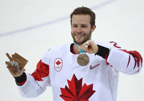 GANGNEUNG, SOUTH KOREA - FEBRUARY 24, 2018: Canada s Cody Goloubef shows his bronze medal after winning the men s bronze medal Ice hockey Eishockey game between the Czech Republic and Canada at Gangneug Hockey Centre at the 2018 Winter Olympic Games Olympische Spiele Olympia OS Canada won the game 6-4. Valery Sharifulin TASS  TS075998