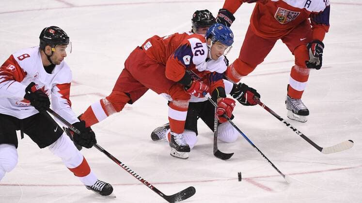 (180224) -- PYEONGCHANG, Feb. 24, 2018 -- Petr Koukal (2nd L) of the Czech Republic vies for the puck against Canada during the men s bronze medal game of Ice hockey Eishockey at the 2018 PyeongChang Winter Olympic Games Olympische Spiele Olympia OS at Gangneung Hockey Centre, Gangnueng, South Korea, Feb. 24, 2018. Canada won 6-4 and claimed the bronze medal. ) (SP)OLY-SOUTH KOREA-PYEONGCHANG-ICE HOCKEY-MEN S BRONZE MEDAL GAME WangxHaofei 