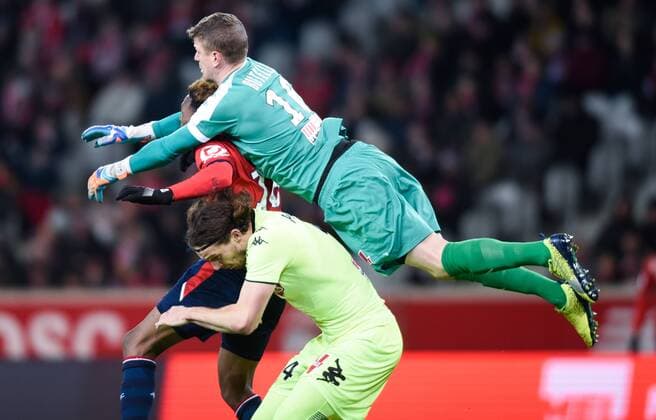 Lebo Mothiba ( Lille ) - Ludovic Butelle ( Angers ) - Mateo Pavlovic ( Angers ) FOOTBALL : Lille OSC vs SCO Angers - Ligue 1 - Lille - 24 02 2018 FedericoPestellini Panoramic 
