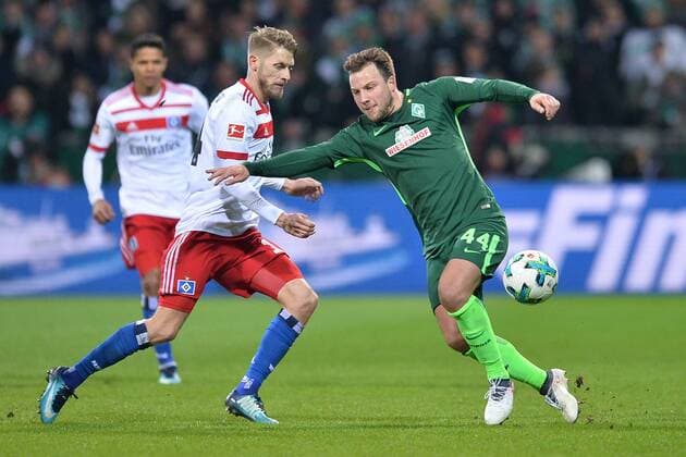 Soccer 1 Bundesliga 24 Gameday Werder Bremen Hamburger SV on 24 02 2018 at the Weser Stadium in Bremen Philipp Bargfrede Bremen forward Aaron Hunt Hamburg behind xTTx
