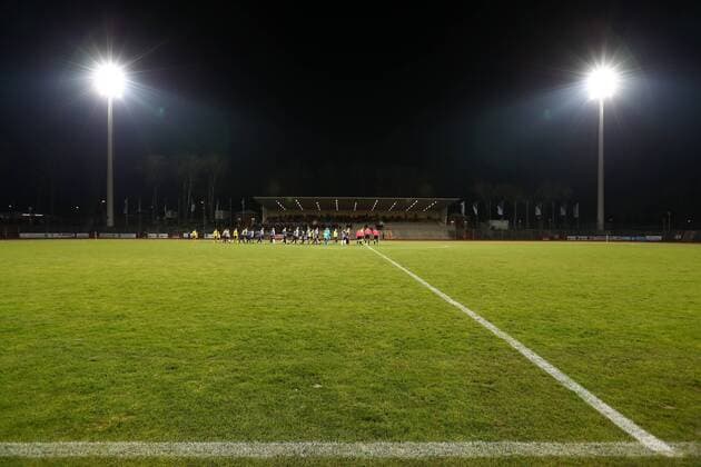 Thursday 22 02 2018 Season 2017 2018 20 Round of the Regionalliga West in Bochum Lohrheidestadion SG Wattenscheid 09 BVB 09 Borussia Dortmund II Opposite stand in floodlight with players running into it