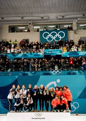 180225 Players of South Korea Sweden and Japan pose for a picture on the podium after the Womens Curling Final between South Korea and Sweden during day sixteen of the 2018 Winter Olympics on February 25, 2018 in Pyeongchang Photo Petter Arvidson PICTURE BODY N Code PA 160200  Copyright: PETTERxARVIDSON BB180225PA031