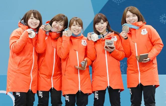 Pyeongchang Olympics Members of the Japanese women s curling team pose during the medal ceremony at the Pyeongchang Winter Olympics in Gangneung, South Korea on Feb. 25, 2018. They won bronze. 