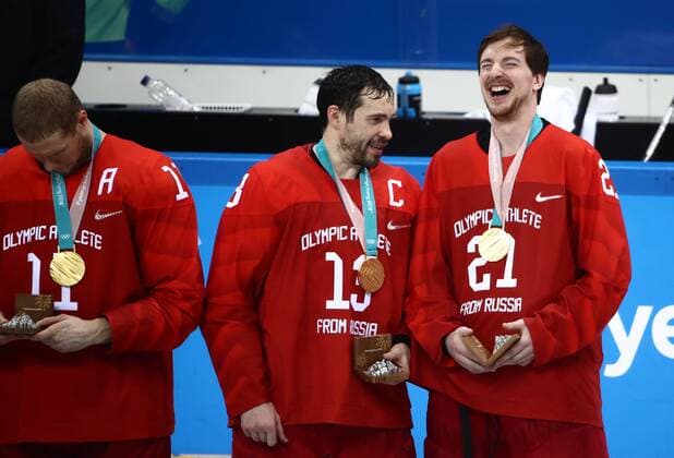 GANGNEUNG, SOUTH KOREA - FEBRUARY 25, 2018: Gold medalists, the Olympic Athletes from Russia react during a victory ceremony for the men s Ice hockey Eishockey event at Gangneung Hockey Centre at the 2018 Winter Olympic Games Olympische Spiele Olympia OS The Olympic Athletes from Russia won 4-3 in overtime. Valery Sharifulin TASS  TS075A55