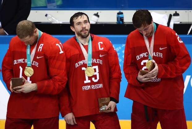 GANGNEUNG, SOUTH KOREA - FEBRUARY 25, 2018: Gold medalists, the Olympic Athletes from Russia at a victory ceremony for the men s Ice hockey Eishockey event at Gangneung Hockey Centre at the 2018 Winter Olympic Games Olympische Spiele Olympia OS The Olympic Athletes from Russia won 4-3 in overtime. Valery Sharifulin TASS  TS075A56