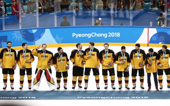 GANGNEUNG, SOUTH KOREA - FEBRUARY 25, 2018: Silver medalists, players of Germany at a victory ceremony for the men s Ice hockey Eishockey event at Gangneung Hockey Centre at the 2018 Winter Olympic Games Olympische Spiele Olympia OS The Olympic Athletes from Russia won 4-3 in overtime. Valery Sharifulin TASS  TS075A6C