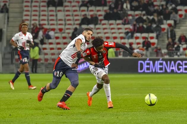 Yassine Benzia (Lille) - Adrien Tameze (OGC Nice) FOOTBALL : OGC Nice vs Lille - Ligue 1 - Nice - 02 03 2018 NorbertScanella Panoramic 