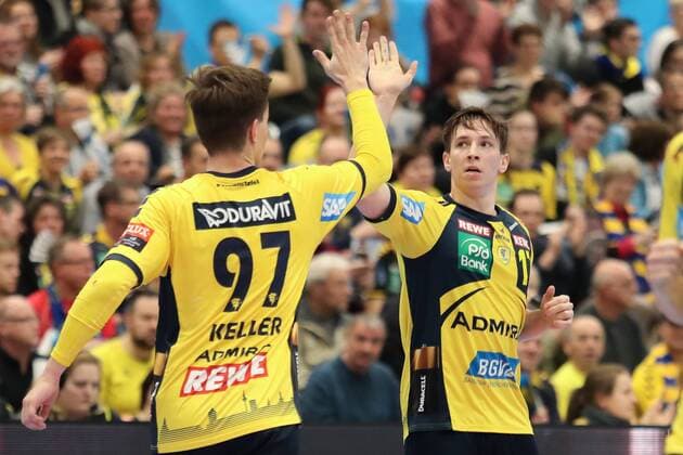 Rico Keller RNL 97 Jerry Tollbring RNL 17 celebrate a goal cheering goal success celebrate the goal goal celebration cheering over the goal optimistic Action Action Handball Champions League Rhein Neckar Löwen HBC Nantes xozx