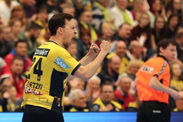 Patrick Groetzki RNL 24 rejoices over a goal Cheers Torjubel Goalkeeping celebrate the goal goal celebration Cheers over the goal optimistic Action Action Handball Champions League Rhein Neckar Löwen HBC Nantes xozx