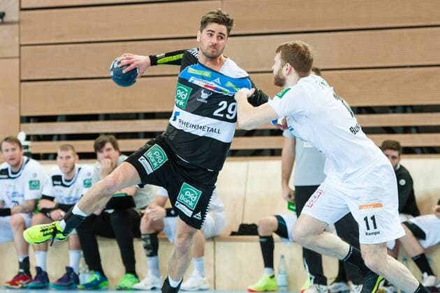 Alexander Oelze No. 29 Vikings tries to beat Arseniy Buschmann Nr 11 Elbflorenz HC Rhein Vikings HC HC Dresden Dresden Handball 2 Bundesliga 03 03 18 Dusseldorf NRW Germany Castello Copyright: xcdn_nszx