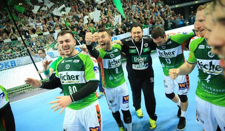 04 03 xfgx Handball DHB Cup 1 4 Final HSG Wetzlar TVB Stuttgart emspor v l cheering at No. 80 Jannik Kohlbacher HSG Wetzlar No. 8 Philipp Pöter HSG Wetzlar and No. 13 Filip Mirkulovski HSG Wetzlar Wetzlar
