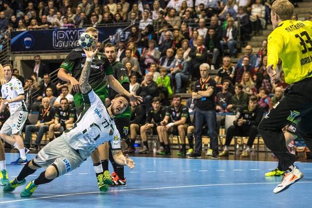 04 03 18 Füchse Berlin Helvetia Anaitasuna EHF Cup Handball Group Stage Men Season 2017 18 Picture Jump to the circle of KM Johan Koch Füchse Berlin Nr 77 l against TH Henrik Nordlander Nr 33 Anaitasuna xsmmpJPGx