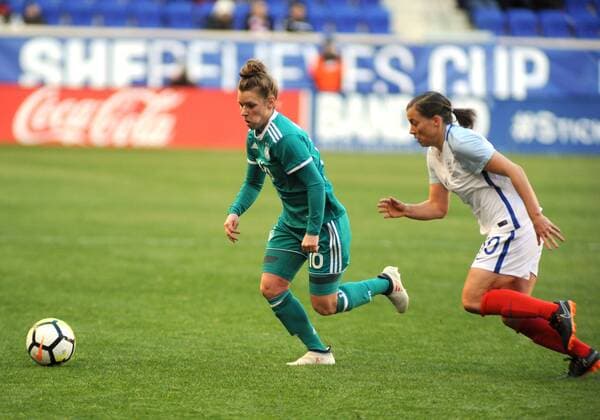 March 4, 2018 - March 04, 2018 - German national team Nationalteam Midfielder DZSENIFER MAROZSAN (10) kicks the ball up field past FRAN KIRBY (10) during first half action. The friendly match was played at Red Bull Arena, Harrison, New Jersey Soccer 2018 - The German National Team Draws England 2-2... - ZUMAc123 82152160st Copyright: xBennettxCohenx