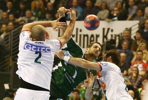 Zeljko Musa Stipe Mandalinic Mads Christiansen Action Game scene Duel sports Handball DHB Cup DKB Bundesliga Mens Season 2017 2018 07 03 2018 Füchse Berlin vs SC Magdeburg SCM