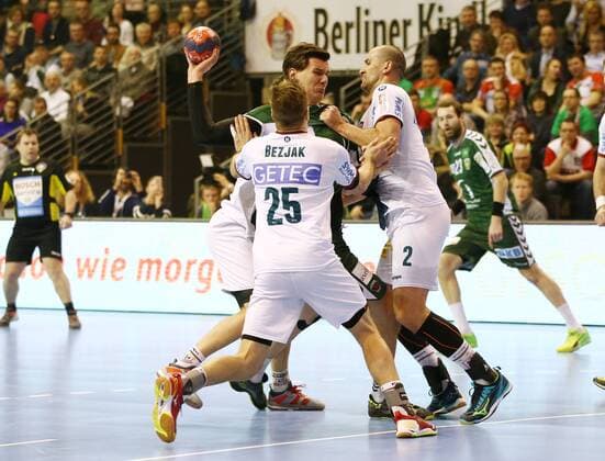 Erik Schmidt Marko Bezjak Zeljko Musa Action Match scene Duel Sport Handball DHB Pokal DKB Bundesliga Mens Season 2017 2018 07 03 2018 Füchse Berlin vs SC Magdeburg SCM