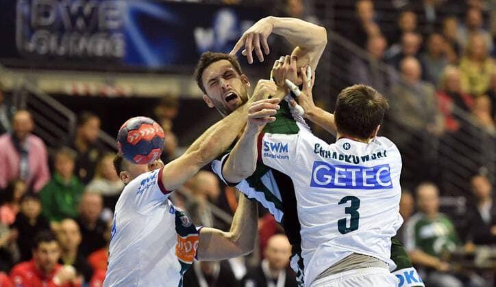 Marko Kopljar u200b u200bfoxes on the throw left Christian O Sullivan Magdeburg on the right Piotr Chrapkowski Magdeburg foxes Berlin SC Magdeburg DHB Cup quarter finals 2017 2018 Men Men Handball Germany Germany Max Schmeling Halle Berlin 7 3 2018