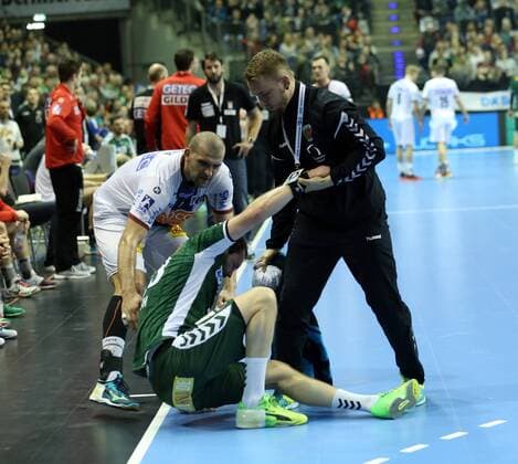 GER DHB Pokal FUEL BERLIN VS SC Magdeburg 07 03 2018 Max Schmeling Halle Berlin GER DHB Cup FUEL BERLIN VS SC Magdeburg in picture Steffen Faeth Fuechse Berlin 23 injured Zeljko Musa SC Magdeburg 2 nordphotox xEngler nph00076