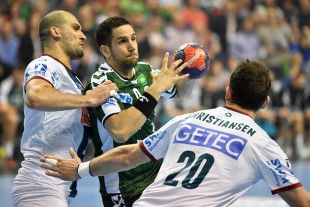 Stipe Mandalinic foxes with ball left Zeljko Musa Magdeburg right Mads Christiansen Magdeburg foxes Berlin SC Magdeburg DHB Cup quarter finals 2017 2018 Men Men Handball Germany Germany Max Schmeling Halle Berlin 7 3 2018
