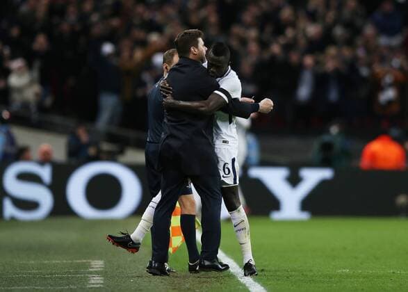 7th March 2018, Wembley Stadium, London England; UEFA Champions League football, round of 16, 2nd leg, Tottenham Hotspur versus Juventus; Tottenham Hotspur Manager Mauricio Pochettino celebrates with Davinson Sanchez of Tottenham Hotspur after Son Heung-Min of Tottenham Hotspur scores his sides 1st goal in the 39th minute to make it 1-0  ActionPlus11998962