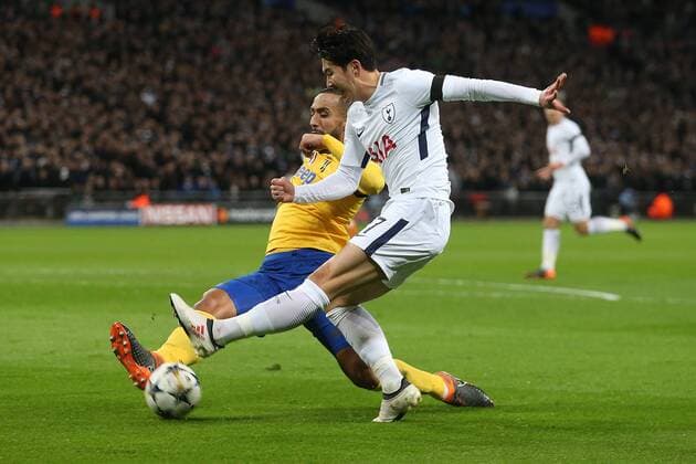 Tottenham Hotspur v Juventus UEFA Champions League Mehdi Benatia of Juventus and Son Heung-Min of Tottenham Hotspur in action during the UEFA Champions League match at Wembley Stadium, London Content Not Available For UK Newspapers Copyright: xPaulxChestertonx FIL-11460-0026