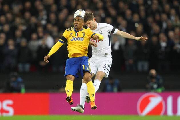 Tottenham Hotspur v Juventus UEFA Champions League Douglas Costa of Juventus and Ben Davies of Tottenham Hotspur in action during the UEFA Champions League match at Wembley Stadium, London Content Not Available For UK Newspapers Copyright: xPaulxChestertonx FIL-11460-0032