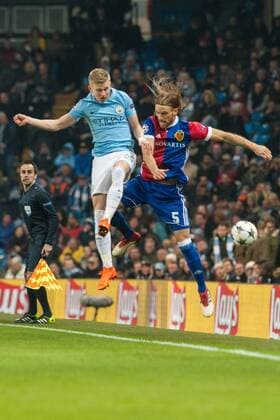 Manchester City v FC Basel UEFA Champions League Oleksandr Zinchenko of Manchester City in an aerial challenge with Michael Lang of Basel during the UEFA Champions League match at the Etihad Stadium, Manchester Content Not Available For UK Newspapers Copyright: xMattxWilkinsonx FIL-11459-0021