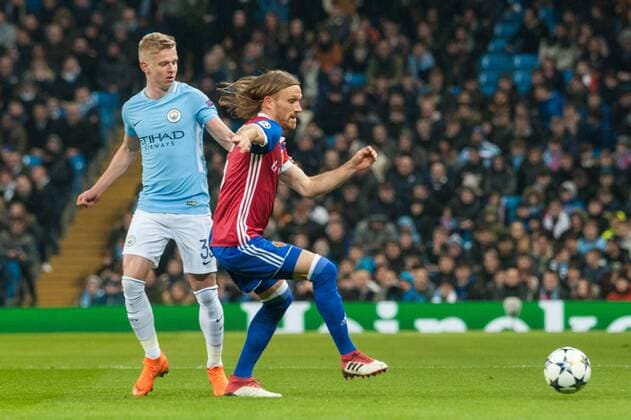 Manchester City v FC Basel UEFA Champions League Michael Lang of Basel takes the ball from Oleksandr Zinchenko of Manchester City during the UEFA Champions League match at the Etihad Stadium, Manchester Content Not Available For UK Newspapers Copyright: xMattxWilkinsonx FIL-11459-0024