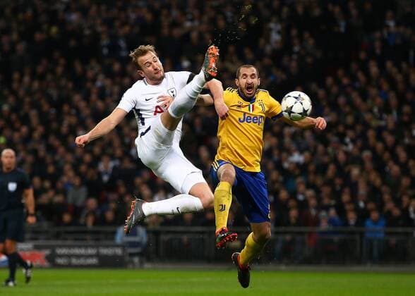 7th March 2018, Wembley Stadium, London England; UEFA Champions League football, round of 16, 2nd leg, Tottenham Hotspur versus Juventus; Harry Kane of Tottenham Hotspur attempting to score a goal past Giorgio Chiellini of Juventus from a corner  ActionPlus11998988