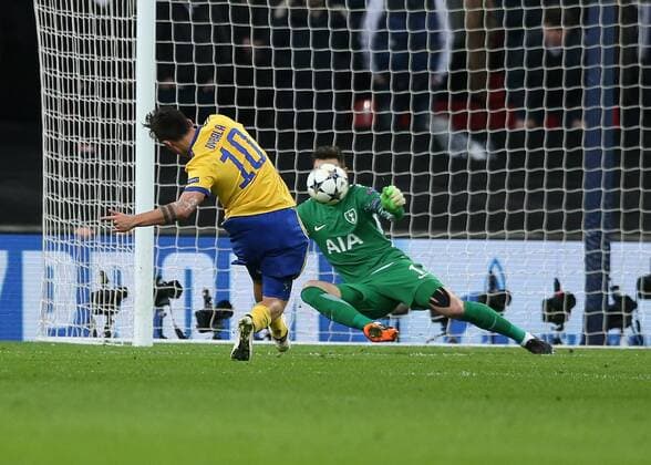 7th March 2018, Wembley Stadium, London England; UEFA Champions League football, round of 16, 2nd leg, Tottenham Hotspur versus Juventus; Paulo Dybala of Juventus scores his sides 2nd goal in the 66th minute to make it 2-1 past Goalkeeper Hugo Lloris of Tottenham Hotspur  ActionPlus11998992