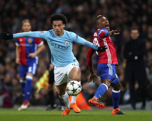 Leroy Sane of Manchester City tackles Serey Die of Basel during the Champions League Round of 16, 2nd Leg match at the Etihad Stadium, Manchester. Picture date: 7th March 2018. Picture credit should read: Simon Bellis Sportimage EDITORIAL USE ONLY. No use with unauthorised audio, video, data, fixture lists, club league logos or live services. Online in-match use limited to 120 images, no video emulation. No use in betting, games or single club league player publications.
