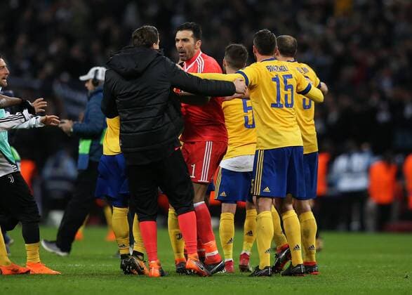 7th March 2018, Wembley Stadium, London England; UEFA Champions League football, round of 16, 2nd leg, Andrea Barzagli of Juventus and Miralem Pjanic of Juventus celebrate with Goalkeeper Gianluigi Buffon of Juventus after the final whistle as Juventus knock out Tottenham Hotspur  ActionPlus11999003