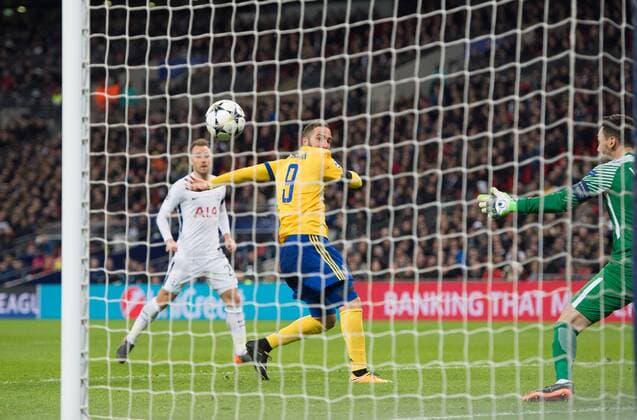 Juventus Gonzalo Gerardo Higuain scoring first goal during the UEFA Champions League match between Tottenham Hotspur and Juventus at Wembley Stadium, London, England on 7 March 2018. Copyright: xAndrewxAleksiejczukx PMI-1869-0023