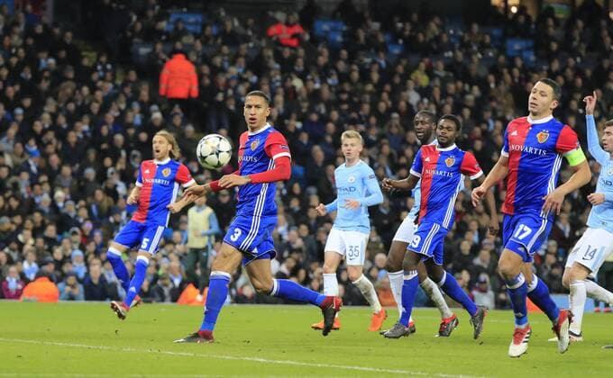 7th March 2018, Etihad Stadium, Manchester, England; UEFA Champions League football, round of 16, 2nd leg, Manchester City versus FC Basel; Leo Lacroix of Basel watches a cross go out of play  ActionPlus11999007