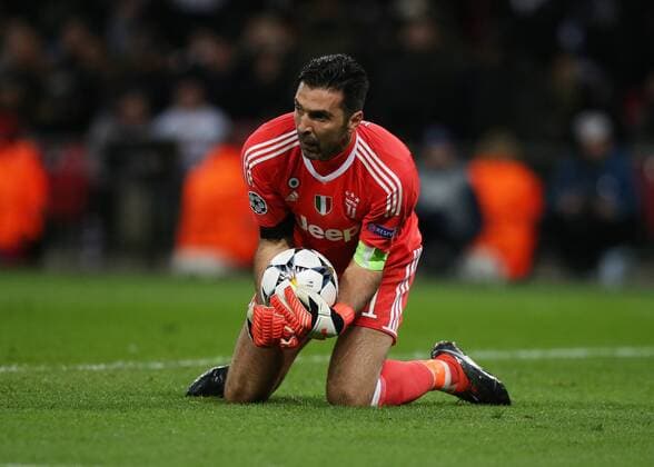 7th March 2018, Wembley Stadium, London England; UEFA Champions League football, round of 16, 2nd leg, Tottenham Hotspur versus Juventus; Goalkeeper Gianluigi Buffon of Juventus collecs the ball safely  ActionPlus11999021