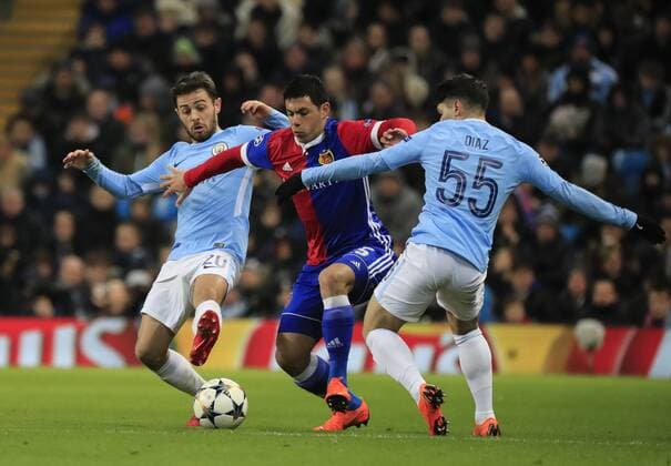 7th March 2018, Etihad Stadium, Manchester, England; UEFA Champions League football, round of 16, 2nd leg, Manchester City versus FC Basel; Brahim Diaz and Bernardo Silva of Manchester City try to stop Blas Riveros of Basel  ActionPlus11999040