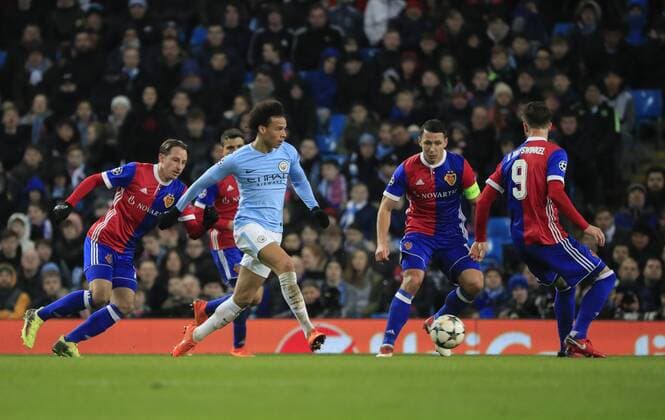 7th March 2018, Etihad Stadium, Manchester, England; UEFA Champions League football, round of 16, 2nd leg, Manchester City versus FC Basel; Leroy Sane of Manchester City runs through the Basel defence  ActionPlus11999048