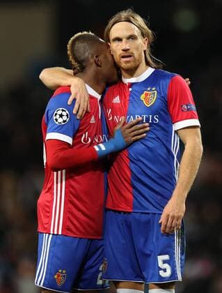 Football - 2017 2018 UEFA Champions League - Round of Sixteen, Second Leg: Manchester City (4) vs. FC Basel (0) Geoffrey Serey Die of FC Basel and Michael Lang of FC Basel at The Etihad. COLORSPORT 