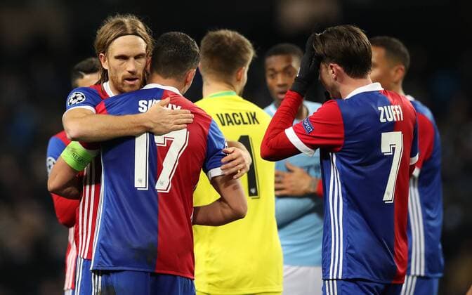 Football - 2017 2018 UEFA Champions League - Round of Sixteen, Second Leg: Manchester City (4) vs. FC Basel (0) Michael Lang and Marek Suchy of FC Basel celebrate at The Etihad. COLORSPORT 