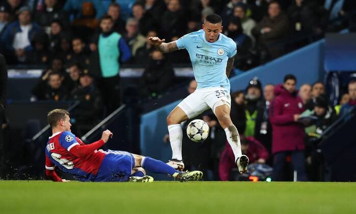 Football - 2017 2018 UEFA Champions League - Round of Sixteen, Second Leg: Manchester City (4) vs. FC Basel (0) Gabriel Jesus of Manchester City and Fabian Frei of FC Basel at The Etihad. COLORSPORT 