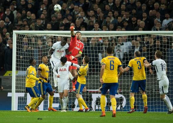 Gianluigi Buffon of Juventus punches the ball clear during the UEFA Champions League round of 16 leg 2of2 match between Tottenham Hotspur and Juventus at Wembley Stadium, London, England on 7 March 2018. Copyright: xVincexMignottx PMI-1866-0048