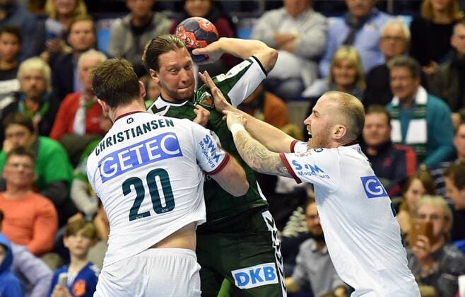 Matthias Zachrisson Füchse with ball left Mads Christiansen Magdeburg right Robert Weber Magdeburg Füchse Berlin SC Magdeburg REWE Cup Quarterfinals 2017 2018 Men Men Handball Germany Germany Max Schmeling Halle Berlin 7 3 2018