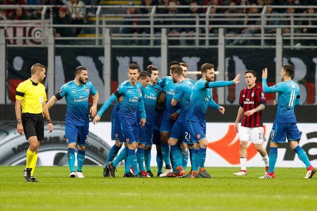 Arsenal players jubilate after the goal scored by Henrikh Mkhitaryan of Arsenal during the UEFA Europa League Round of 16 match between AC Milan and Arsenal at Stadio San Siro, Milan, Italy on 8 March 2018. Copyright: xRobertoxBreganix 19210008