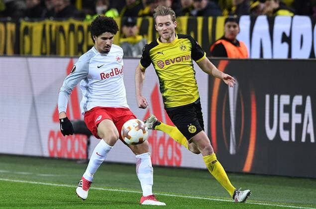 Soccer Europa League Round of 16 Borussia Dortmund FC Salzburg on 08 03 2018 at Signal Iduna Park in Dortmund Andre Ramalho Salzburg on the left Andre Schürrle Dortmund on the right xRx