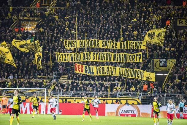 Football UEFA Europa League EL Season 2017 2018 Eighth finals Borussia Dortmund RB Salzburg in Dortmund North Rhine Westphalia The Dortmund fans in the South Stand show banners against Salzburg Copyright: xKirchner DavidxInderliedx