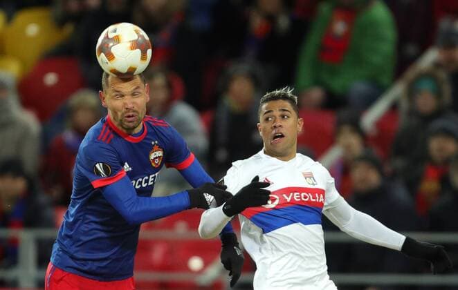 MOSCOW, RUSSIA â€“ MARCH 8, 2018: CSKA Moscow s Sergei Ignashevich (L) and Lyon s Mariano Diaz fight for the ball in the first leg of their 2017 18 UEFA Europa League Round of 16 football match at VEB Arena Stadium. Sergei Bobylev TASS  TS077123
