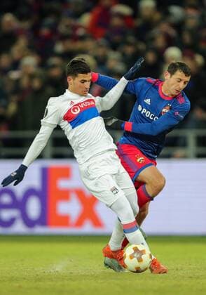 MOSCOW, RUSSIA â€“ MARCH 8, 2018: Lyon s Houssem Aouar (L) and CSKA Moscow s Alan Dzagoev fight for the ball in the first leg of their 2017 18 UEFA Europa League Round of 16 football match at VEB Arena Stadium. Sergei Bobylev TASS  TS077125