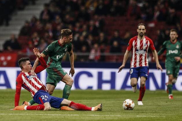 8th March 2018, Wanda Metropolitano, Madrid, Spain; UEFA Europa League football, round of 16, 1st leg, Atletico Madrid versus Lokomotiv& xa0;Moscow; Jose Maria Gimenez (Atletico de Madrid) fights for control of the ball with Anton Miranchuk (Lokomotiv Moscu)  ActionPlus11999248