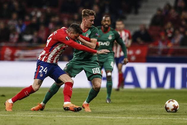 8th March 2018, Wanda Metropolitano, Madrid, Spain; UEFA Europa League football, round of 16, 1st leg, Atletico Madrid versus Lokomotiv& xa0;Moscow; Jose Maria Gimenez (Atletico de Madrid) fights for control of the ball with Anton Miranchuk (Lokomotiv Moscu)  ActionPlus11999247