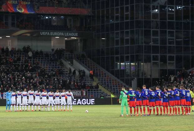 MOSCOW, RUSSIA â€“ MARCH 8, 2018: Lyon s and CSKA Moscow s players hold a minute s silence in memory of the late Italian footballer Davide Astori ahead of the first leg of their 2017 18 UEFA Europa League Round of 16 football match at VEB Arena Stadium. Sergei Bobylev TASS  TS07712A