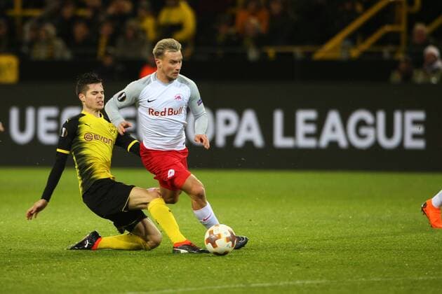 SOCCER - EL, Dortmund vs RBS DORTMUND,GERMANY,08.MAR.18 - SOCCER - UEFA Europa League, last sixteen, Borussia Dortmund vs Red Bull Salzburg. Image shows Julian Weigl (Dortmund) and Fredrik Gulbrandsen (RBS). GEPAxpictures xMathiasxMandl